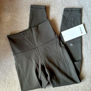 New with tags Lululemon Wunder Train HR tight 25" Leggings size 4 pockets olive